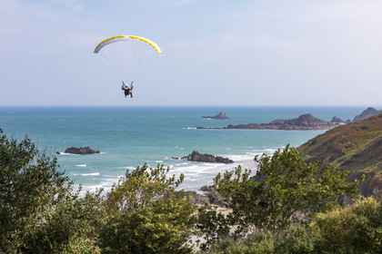 Paragliding along the cliffs of Plouha